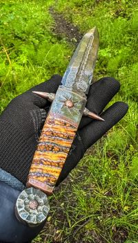 stabilized mammoth tooth on knifehandl
