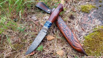 mammoth tooth spacer on knife