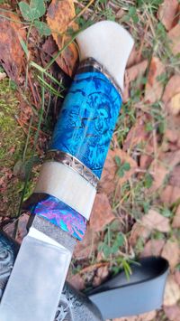 walrus tusk on knifehandl