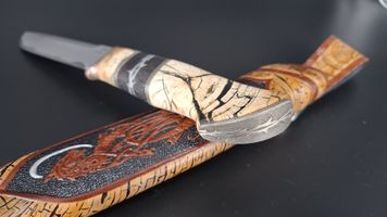mammoth tusk stabilized on knifehandl