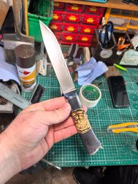 mammoth tusk stabilzied disk on knifehandl
