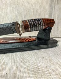 stabilized mammoth tooth block on knifehandl