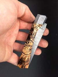mammoth tusk stabilized scales on pocket knife