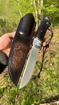 mammoth tooth stabilzed spacer on knife