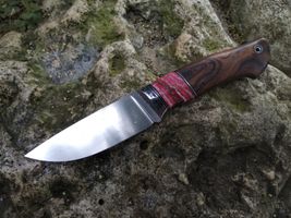mammoth tooth stabilized spacer on knife