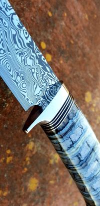 mammoth tooth stabilized on knifehandl