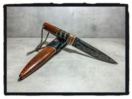 mammoth tooth stabilized on knifehandl