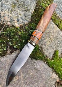 mammoth tooth spacer on knifehanl