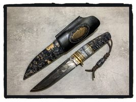 stabilized mammoth tooth spacer on knifehandl