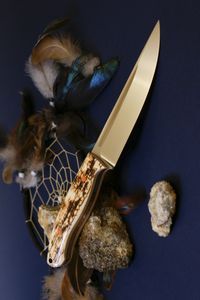 mammoth tusk bark on knife