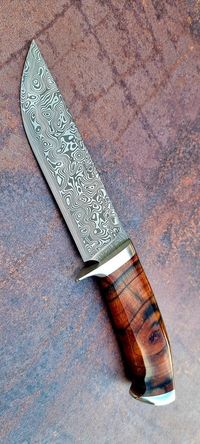 stabilized mammoth tusk on knife