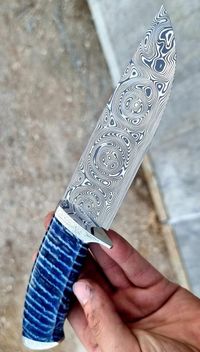 stabilized mammoth tooth on knife
