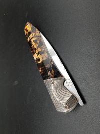 mammoth tusk on pocket knife