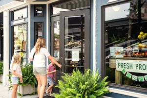 Family entering Neighbors Mercantile