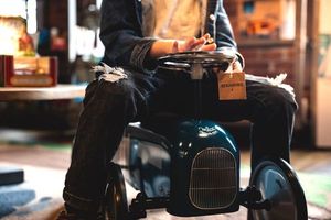 Child on peddle car