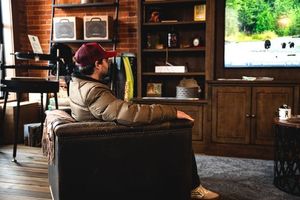 Man relaxing in lounge area