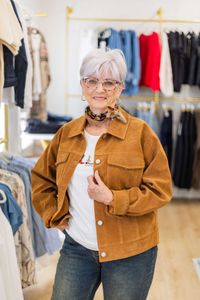 Beautiful senior woman wearing chic clothing