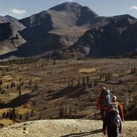 Hikers in the backcountry looking for a camping or backpacking spot