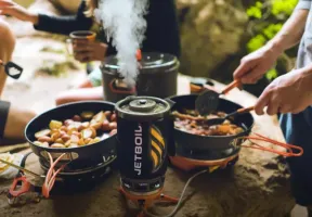Person cooking on JetBoil stove.