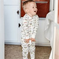 Boy wearing MilkbarnVintage Trailers Organic Cotton Zipper Pajamas