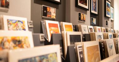 Stock image of art prints on display from Canva.