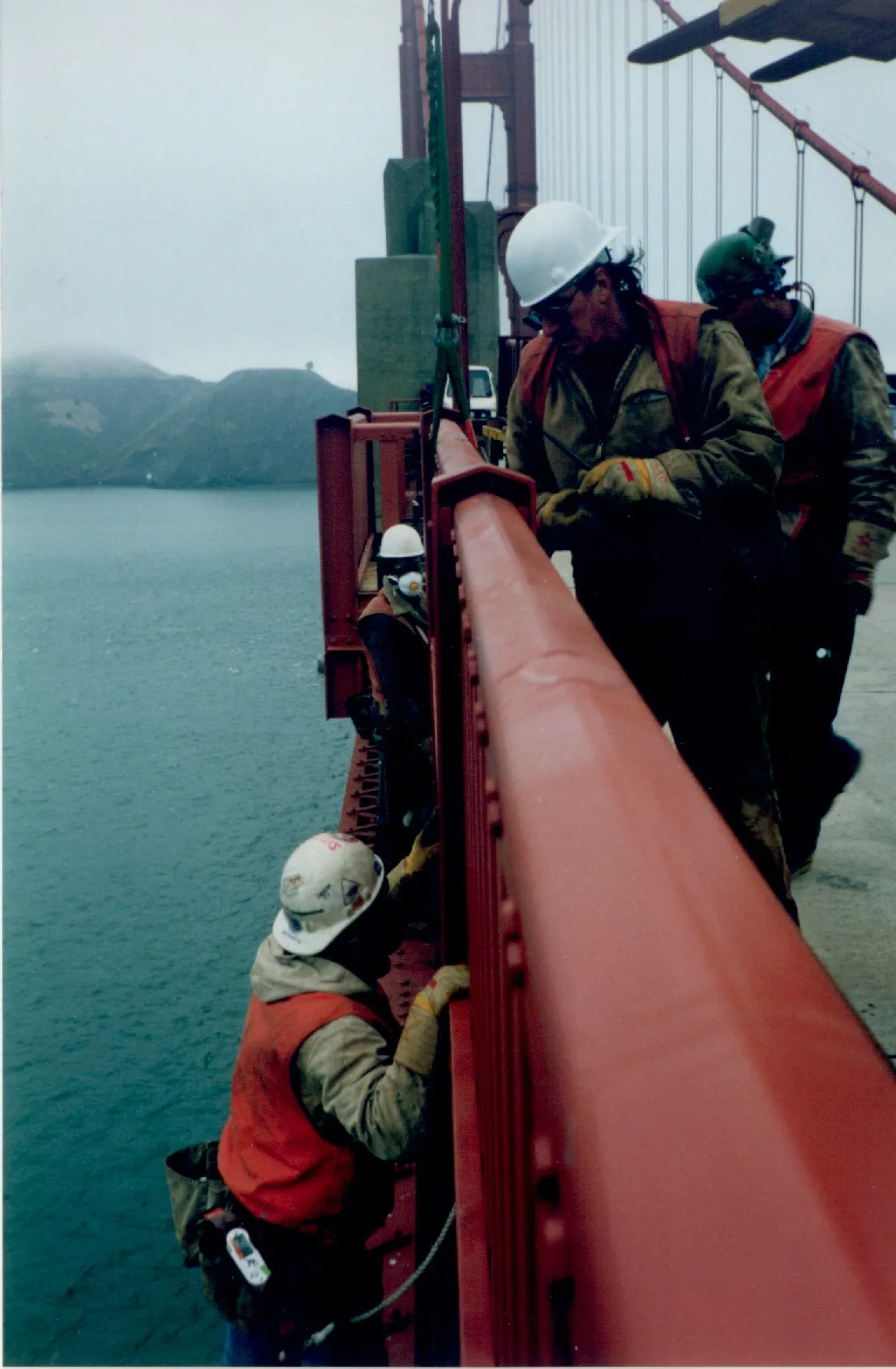 Crews working on the bridge during the handrail replacement