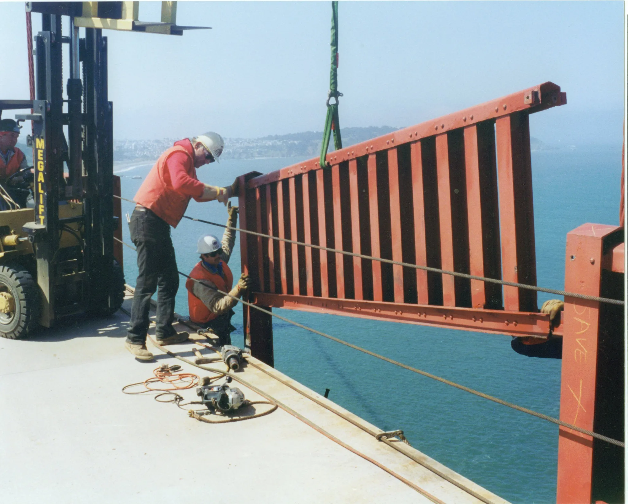 Workers removing original Golden Gate Bridge handrail in 1993