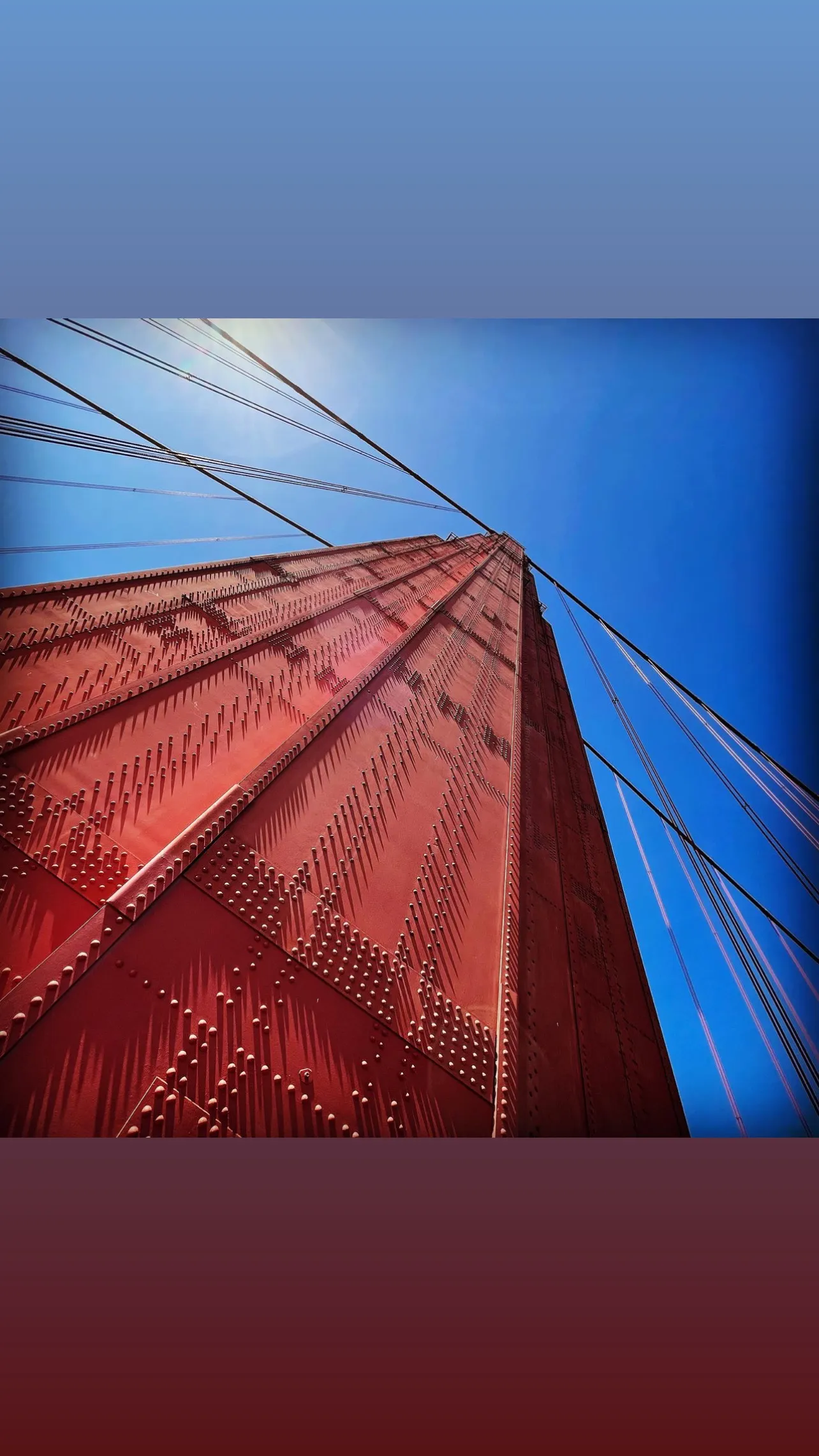 Looking up a Golden Gate Bridge tower.