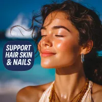Smiling woman with glowing skin at the beach and Support Hair Skin & Nails text, highlighting a selection of supplements for beauty and radiance.