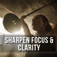 Woman lifting barbell in gym symbolizing nootropic supplements for mental focus, clarity, and workout intensity.