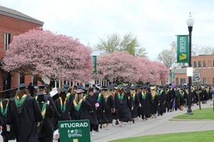 Multiple students graduating.