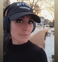 A girl with headphones.