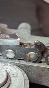 Chainsaw chain tooth before sharpening